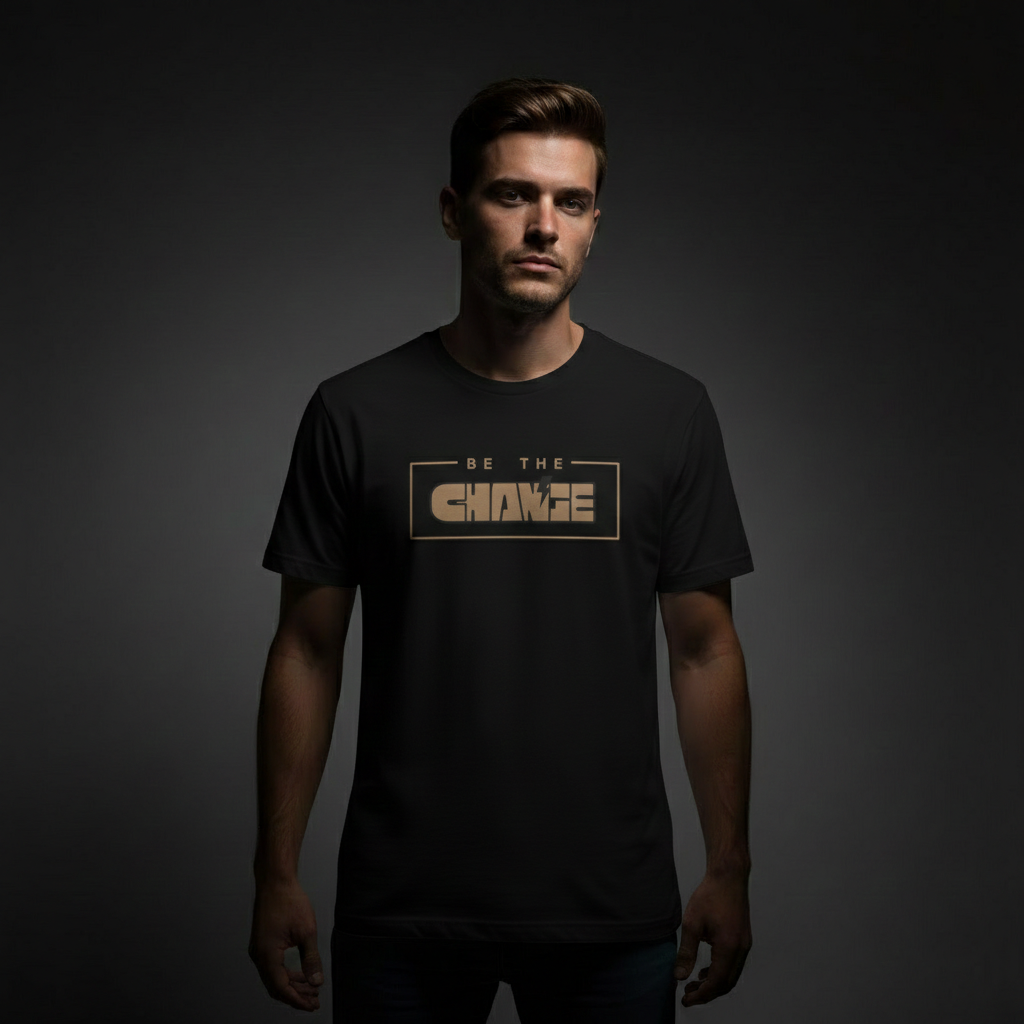 Model wearing Velmora Be The Change black minimalist motivational graphic streetwear t-shirt front print 