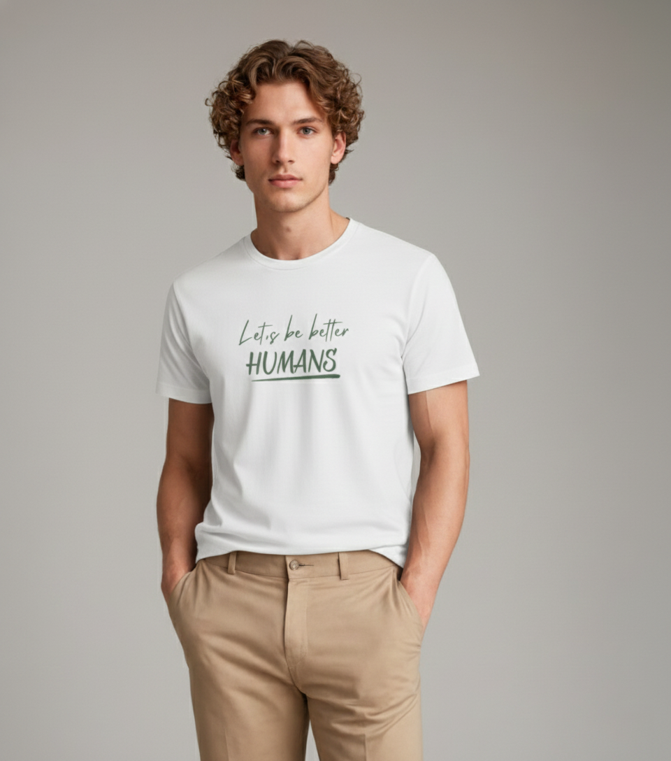 Model wearing Velmora Let's Be Better Humans white premium cotton motivational typography t-shirt front print 